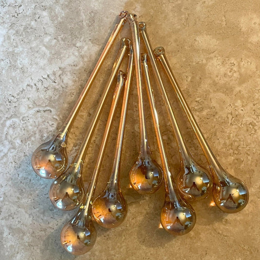 2 Sisters Artisan Glass Set of 8 iridescent, shiny golden champagne glass drop ornaments.